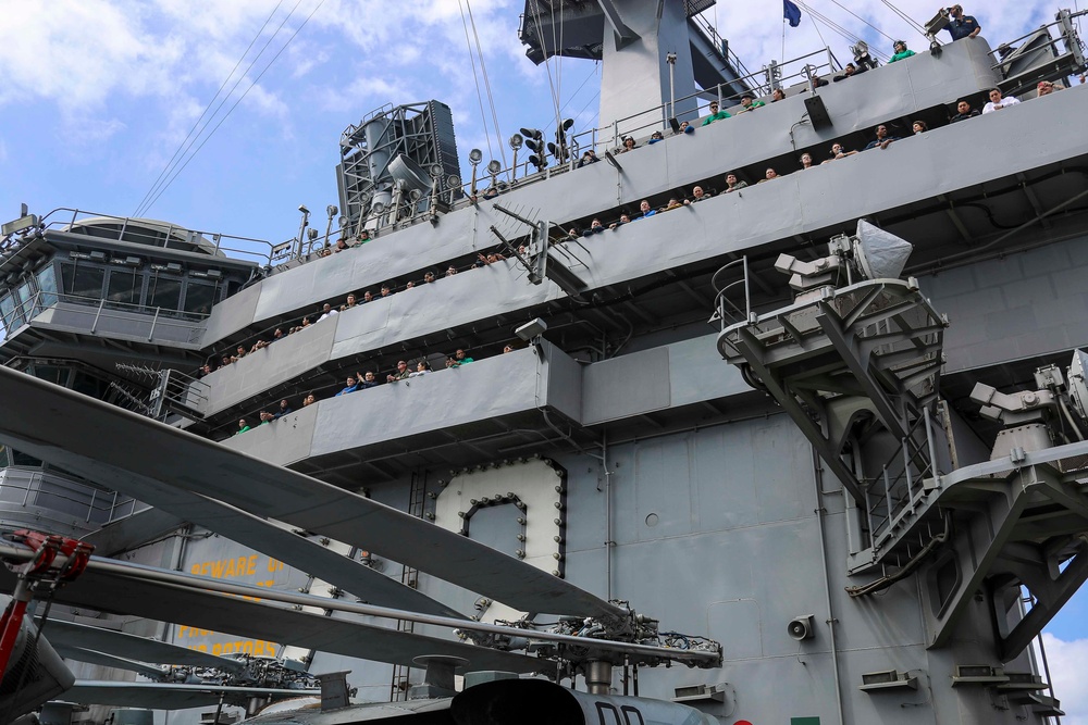 Abraham Lincoln holds an in-flight change of command ceremony for VFA-14