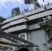 Abraham Lincoln holds an in-flight change of command ceremony for VFA-14