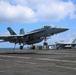 Abraham Lincoln holds an in-flight change of command ceremony for VFA-14