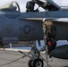 Abraham Lincoln holds an in-flight change of command ceremony for VFA-14