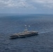 Abraham Lincoln holds an in-flight change of command ceremony for VFA-14