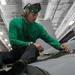 Abraham Lincoln Sailors conduct aircraft maintenance