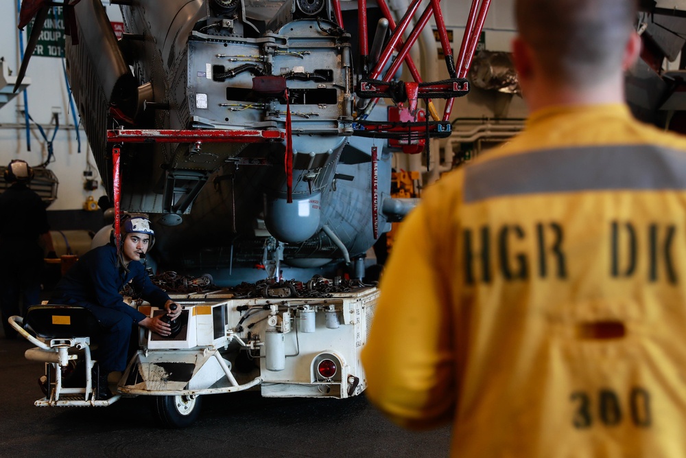 Abraham Lincoln Sailors conduct aircraft maintenance