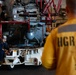 Abraham Lincoln Sailors conduct aircraft maintenance