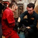 Abraham Lincoln Sailors conduct aircraft maintenance