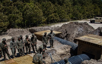 U.S. Marine engineers construct underground defense system