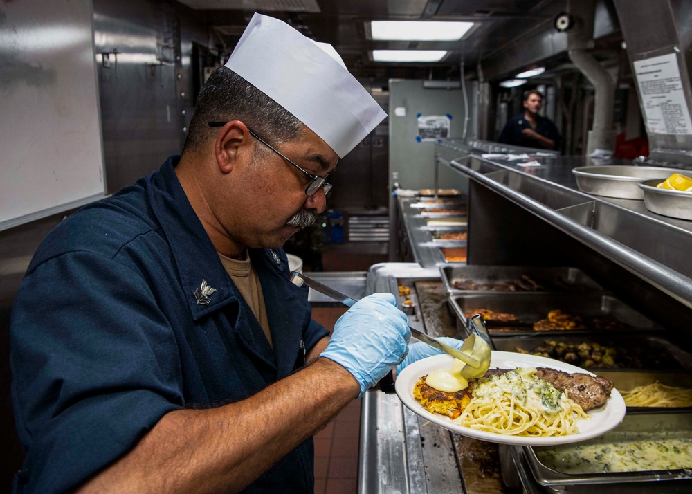 Gridley conducts an April birthday month celebratory dinner on the mess decks