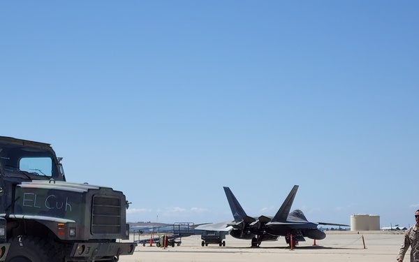 Marine walks by F-22 and MRTVS