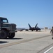 Marine walks by F-22 and MRTVS