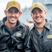 Spruance CO, XO Pose for Photo Alongside USNS Tippecanoe