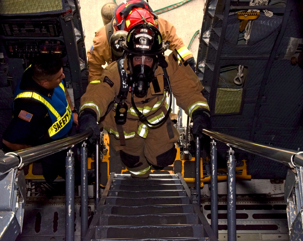 Reserve Citizen Airmen and JBSA firefighters practice C-5M emergency procedures