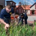 Sailors participate in the Earth Day community cleanup