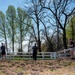 Sailors participate in the Earth Day community cleanup