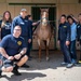 Sailors participate in the Earth Day community cleanup