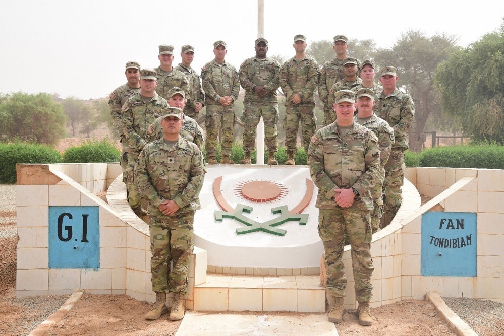 Instructors with the 138th Regional Training Institute (RTI), Indiana National Guard pose for a group photo during graduation practice of the Basic Training Enhancement Program