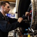 Abraham Lincoln Sailors conduct aircraft maintenance