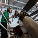 Abraham Lincoln Sailors conduct aircraft maintenance