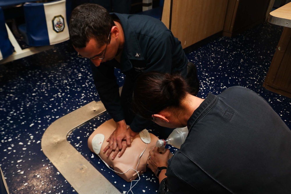 Sailors conduct CPR training aboard Mobile Bay