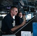 Sailors aboard the Mobile Bay navigate the Philippine Sea