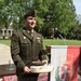 Soldiers from U.S. Army Garrison Italy return a birthday cake after 77 years