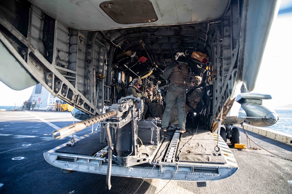 USS Arlington conducts flight operations with Royal Marines