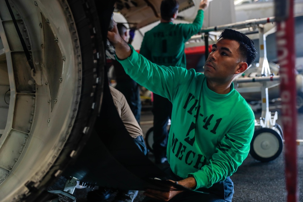 Abraham Lincoln Sailors conduct aircraft maintenance