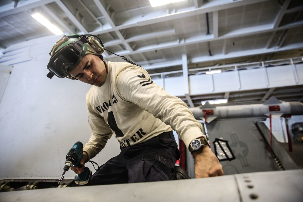Abraham Lincoln Sailors conduct aircraft maintenance