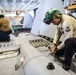Abraham Lincoln Sailors conduct aircraft maintenance