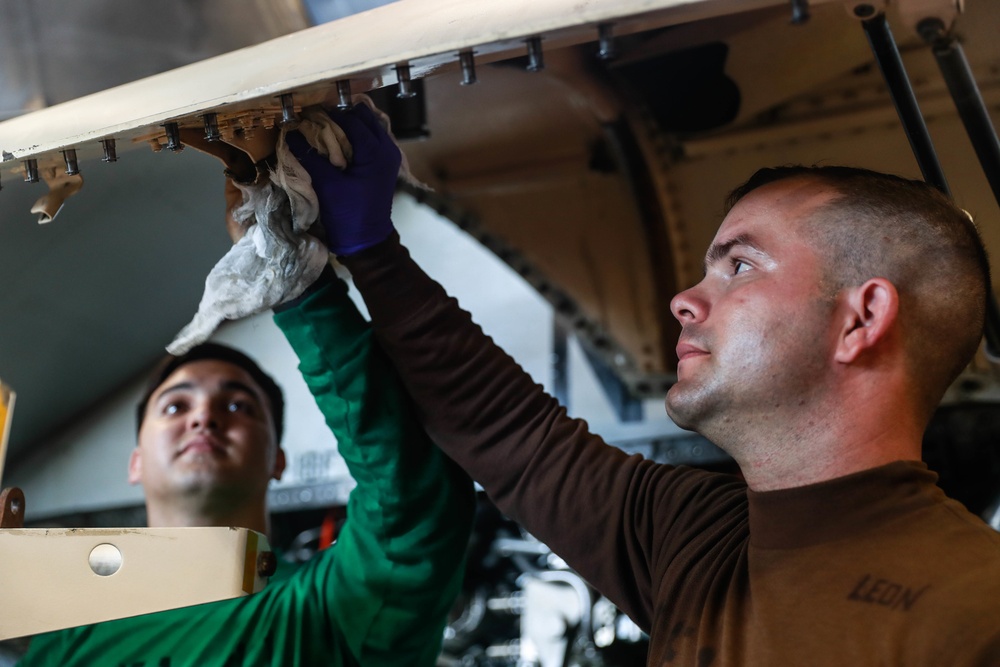 Abraham Lincoln Sailors conduct aircraft maintenance