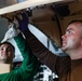 Abraham Lincoln Sailors conduct aircraft maintenance