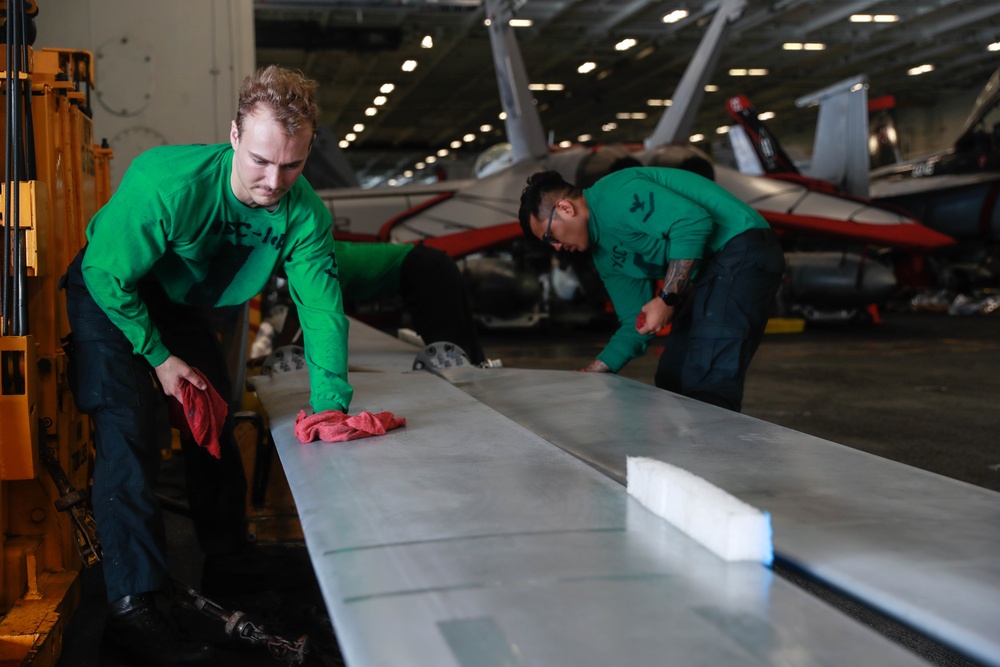 Abraham Lincoln Sailors conduct aircraft maintenance