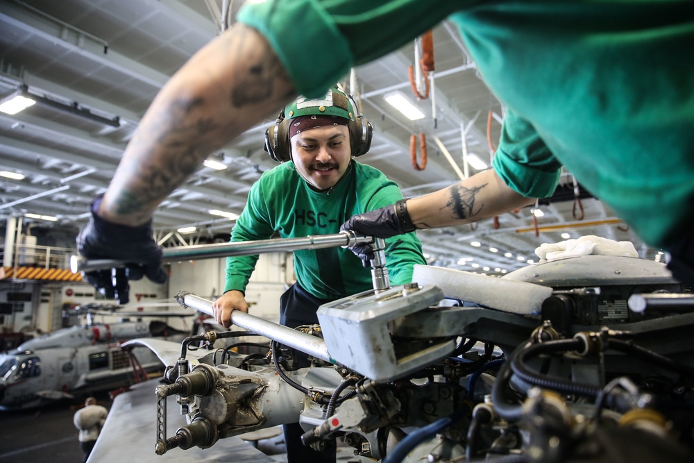 Abraham Lincoln Sailors conducts maintenance