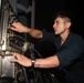 Abraham Lincoln Sailors run an engine test