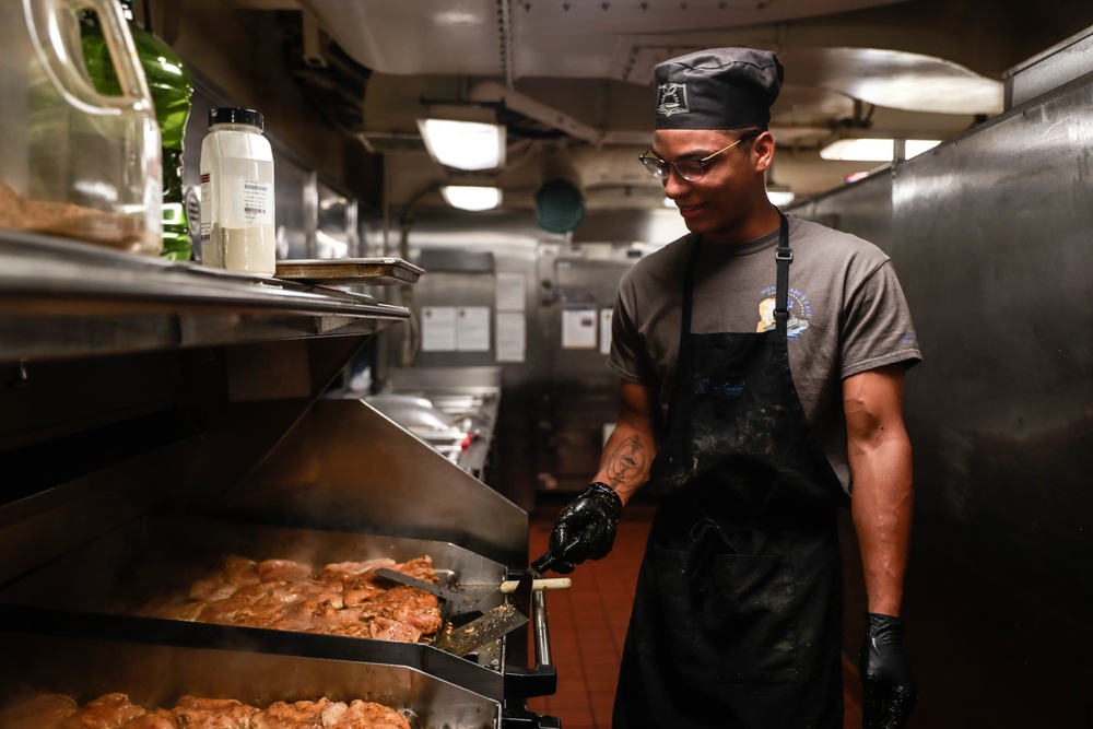 Abraham Lincoln Sailors prepare food