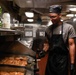 Abraham Lincoln Sailors prepare food