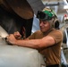 Abraham Lincoln Sailors conduct aircraft maintenance