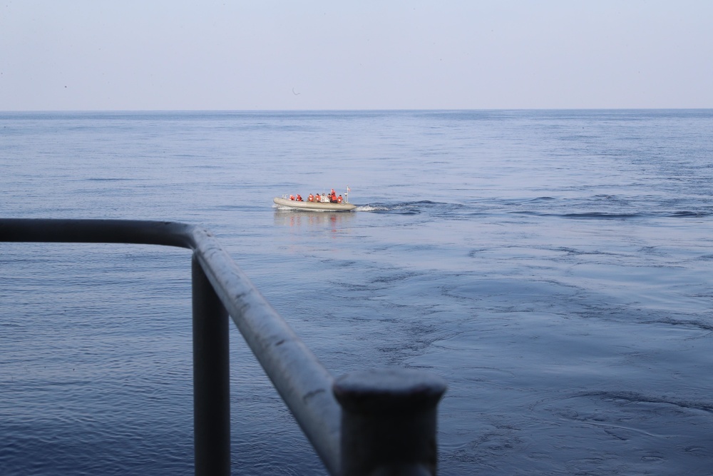 Abraham Lincoln mans the starboard boat deck