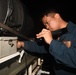 Abraham Lincoln Sailors run an engine test