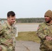 Col. John B. Mountford Visits with 1st Cavalry Division Ammunitions Specialists at Aerial Gunnery