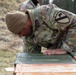 Col. John B. Mountford Visits with 1st Cavalry Division Ammunitions Specialists at Aerial Gunnery