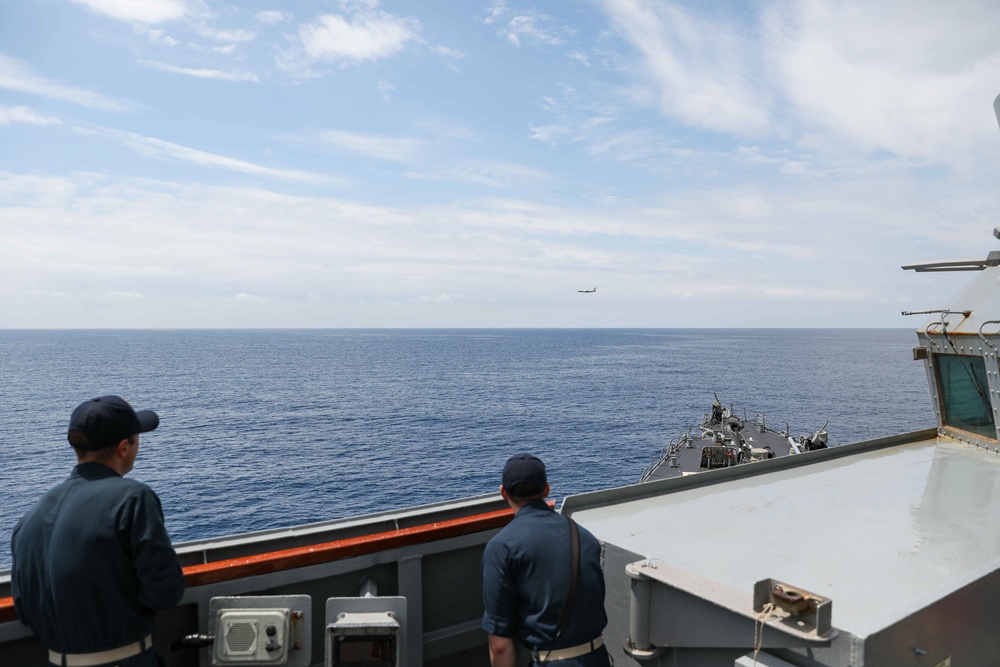 USS Ross conducts detect to engage exercise with P-8 Poseidon