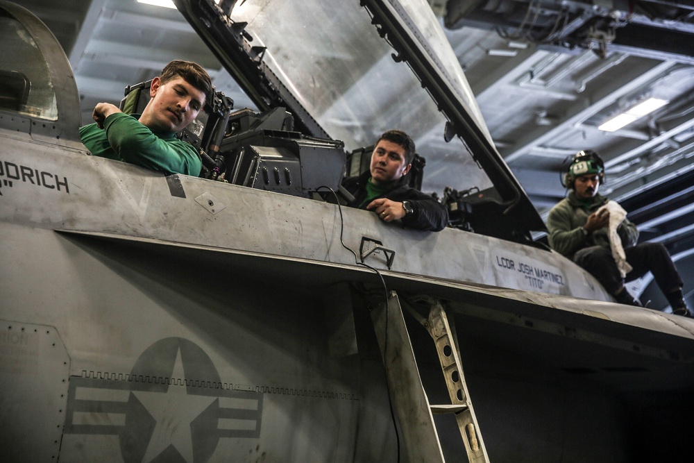 Abraham Lincoln Sailors conduct aircraft maintenance