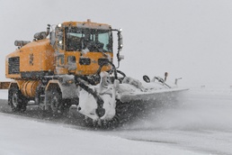 Dirt Boyz work tirelessly to clear airfield amidst blizzard