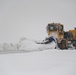 Dirt Boyz work tirelessly to clear airfield amidst blizzard