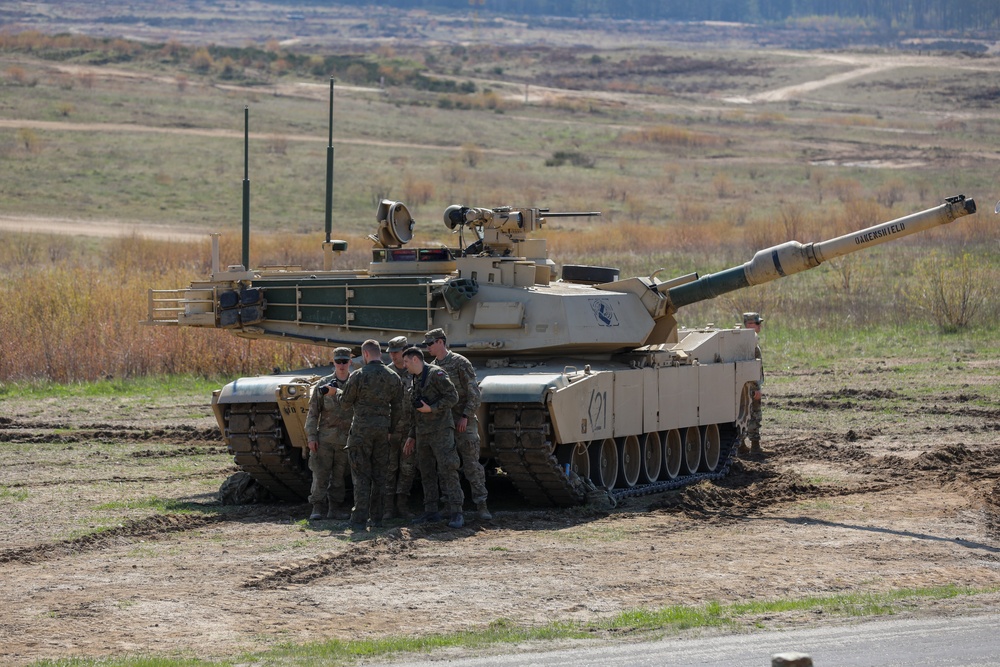 Polish and U.S. Soldiers Watch a Combined Arms Breach During Abrams Operation Summit