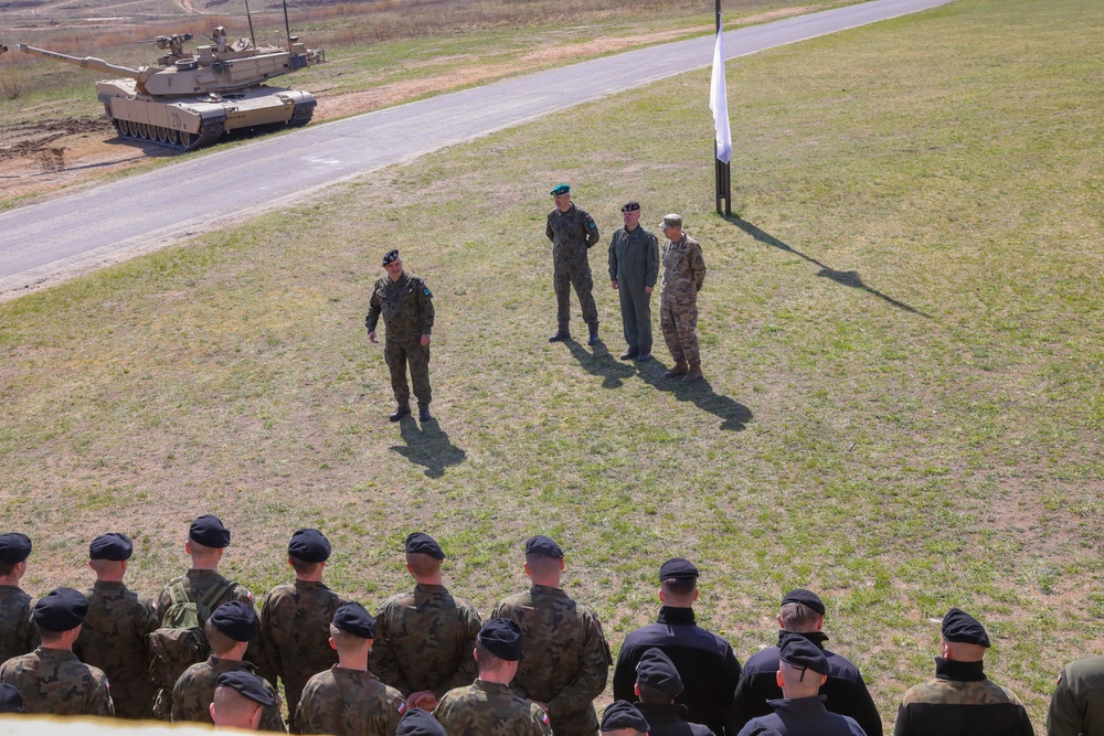 Polish and U.S. Soldiers Watch a Combined Arms Breach During Abrams Operation Summit