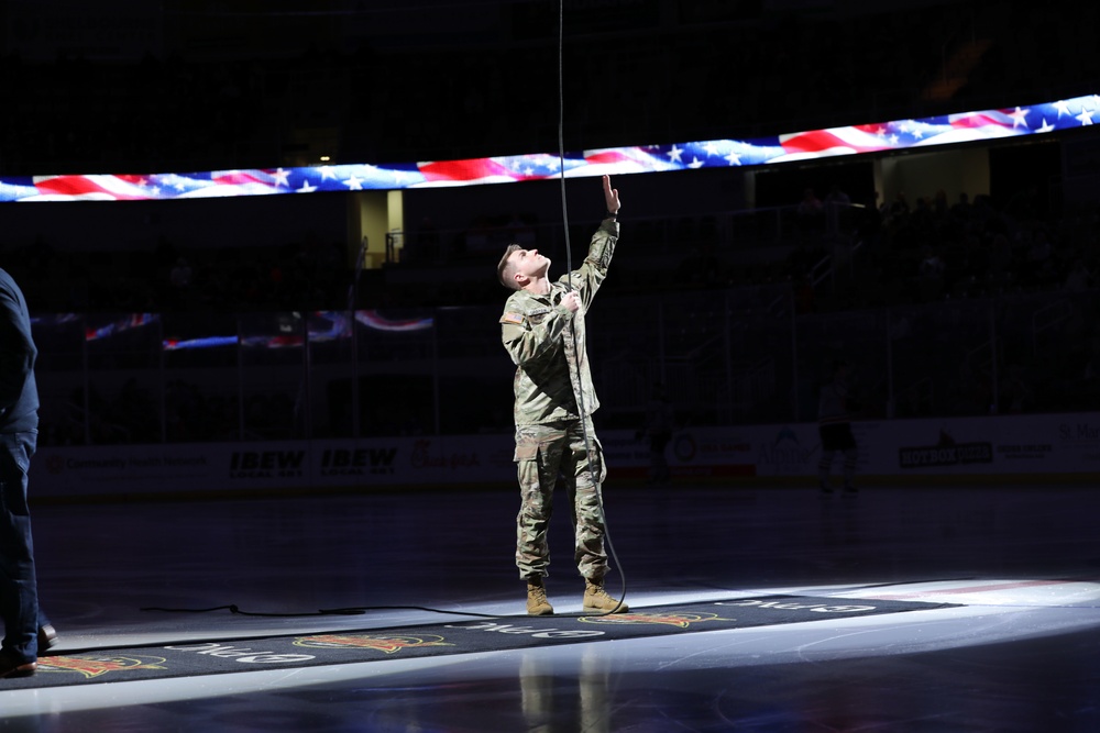 Indiana Guardsman rappels during Indy Fuel game