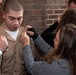 New members of U.S. Navy Band are pinned to E6
