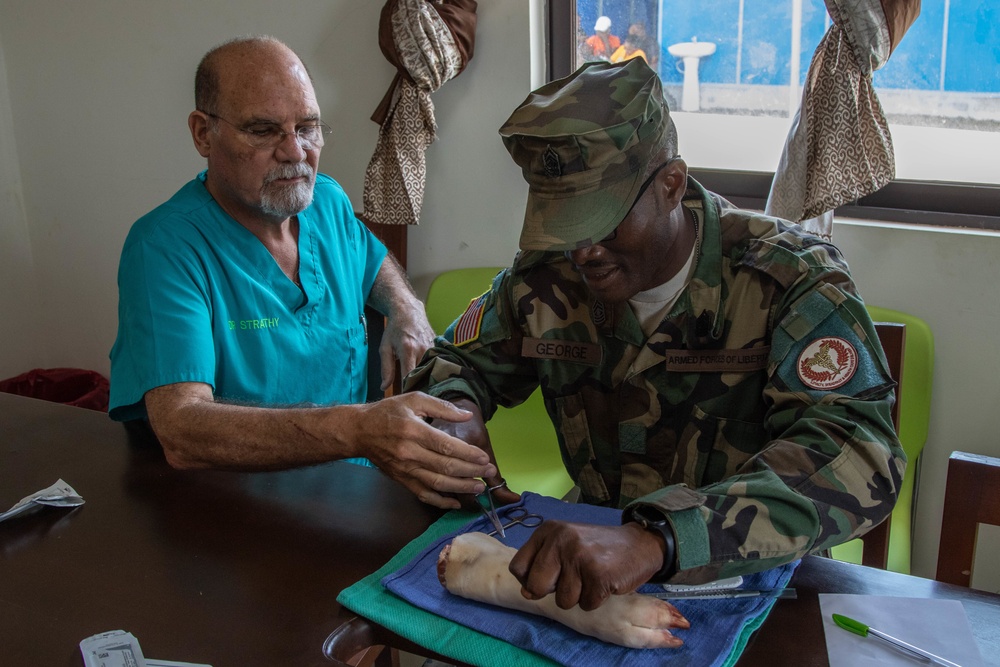Dr. Kevin Strathy teams with MING medics in Liberia