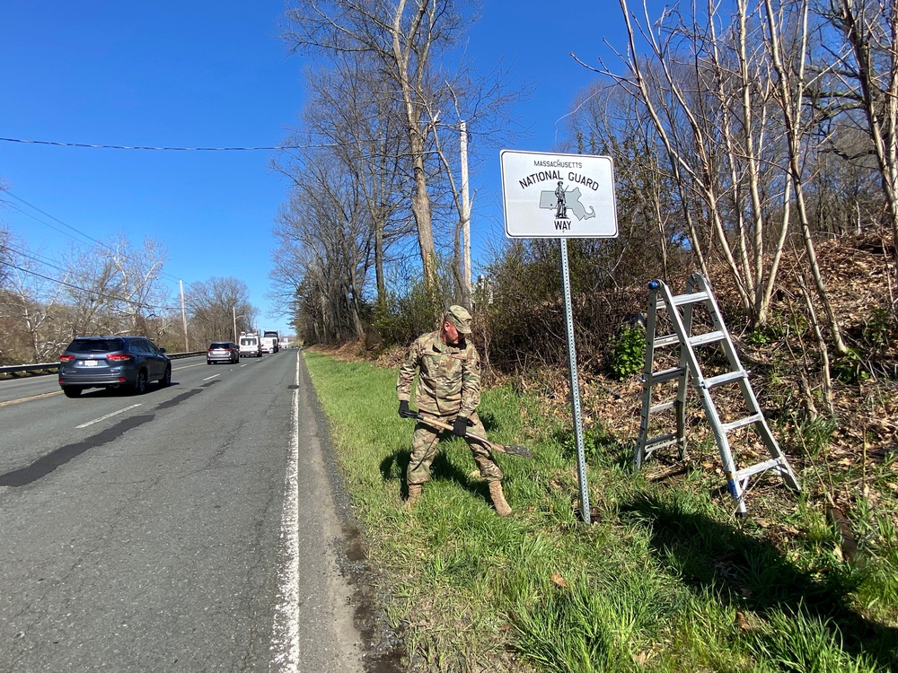 104th Fighter Wing members put up sign